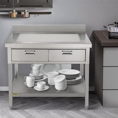 stainless work table with drawers.